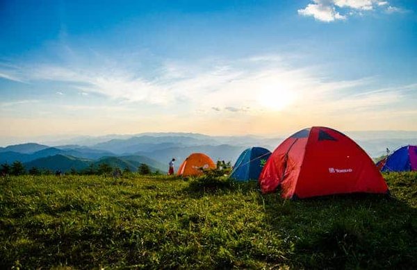 What are the challenges of using biodegradable camping products in the UK and how to overcome them?